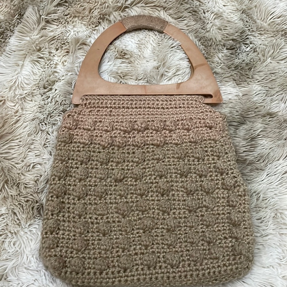 Crocheted homemade clutch tan back with wood handles